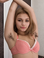 Baby Lizza poses nude by mirror and strips nude