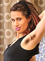 Slender hottie Kitty Bush is back and this time slips a sneaky finger into her hairy ass and big hairy pussy at the same time, whilst squirming around