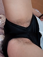 Rada looks really pretty with her hair up as she puts on her red lipstick. She has on a shirt with black shorts and now she is really horny! So she la